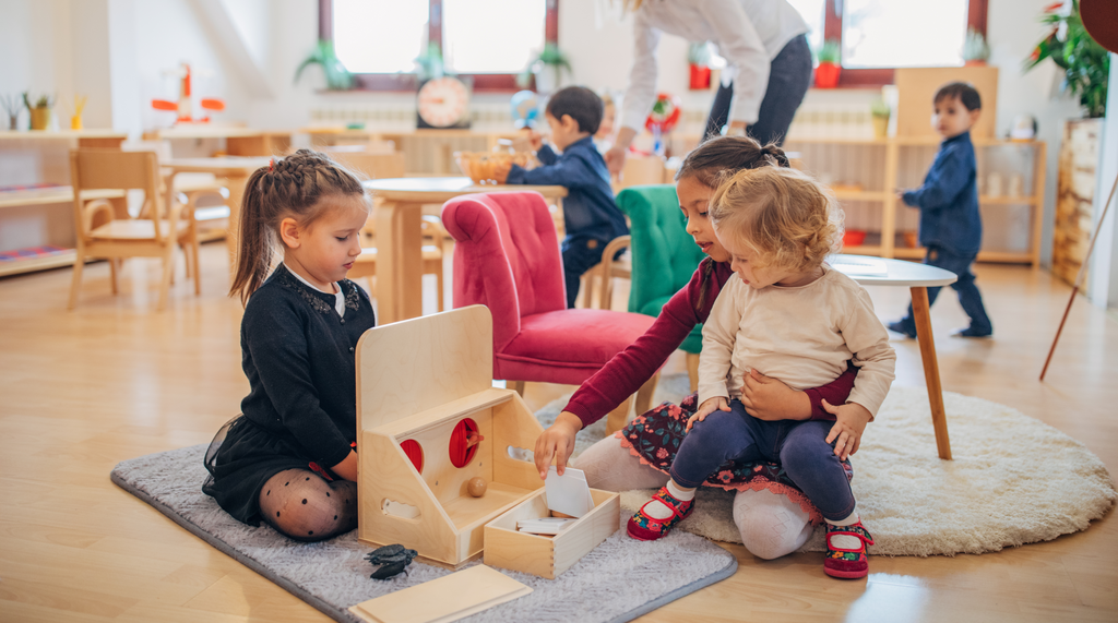 children playing together in classroom